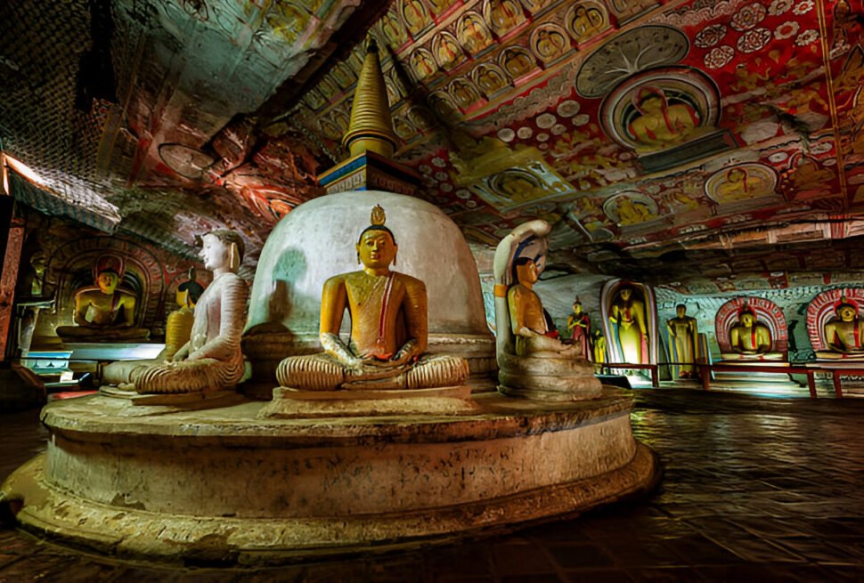 Buddha images and painted cave ceiling at Dambulla